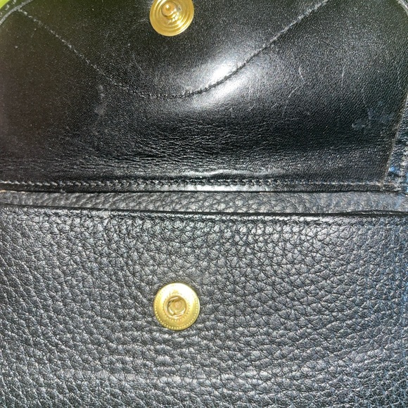 Dooney and Bourke zip along wallet in solid black. - Picture 5 of 12